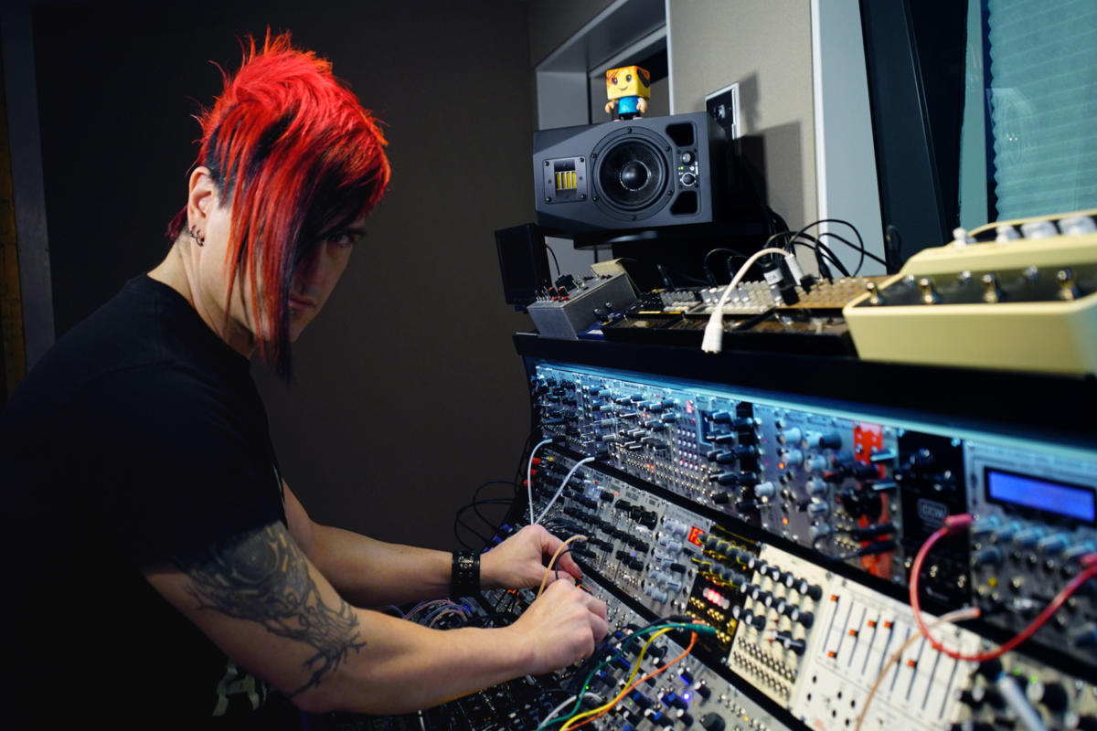 Celldweller and his ADAM A5X desktop monitor in his recording studio